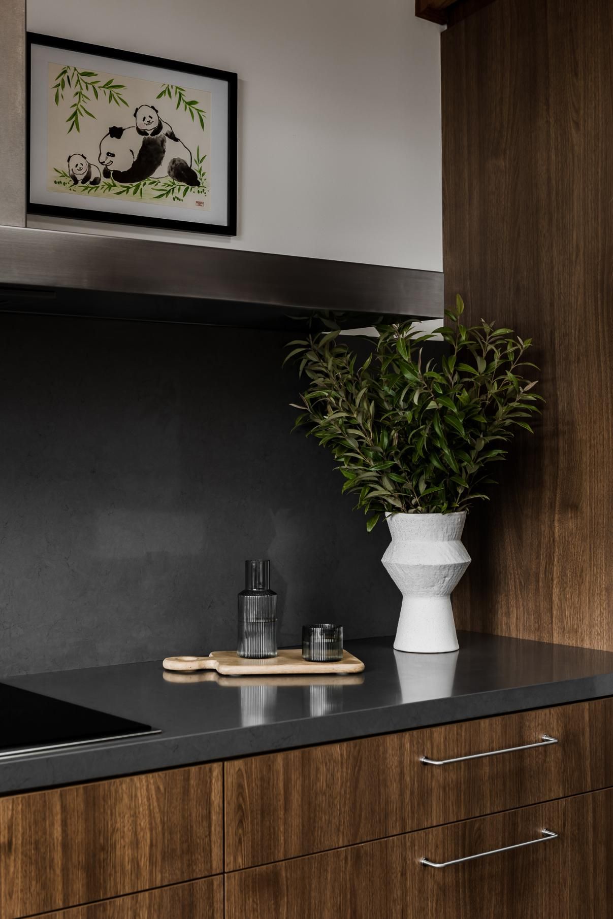 A Kitchen with A Picture of A Panda on The Wall Above the Stove — Goode By Design in Unanderra, NSW
