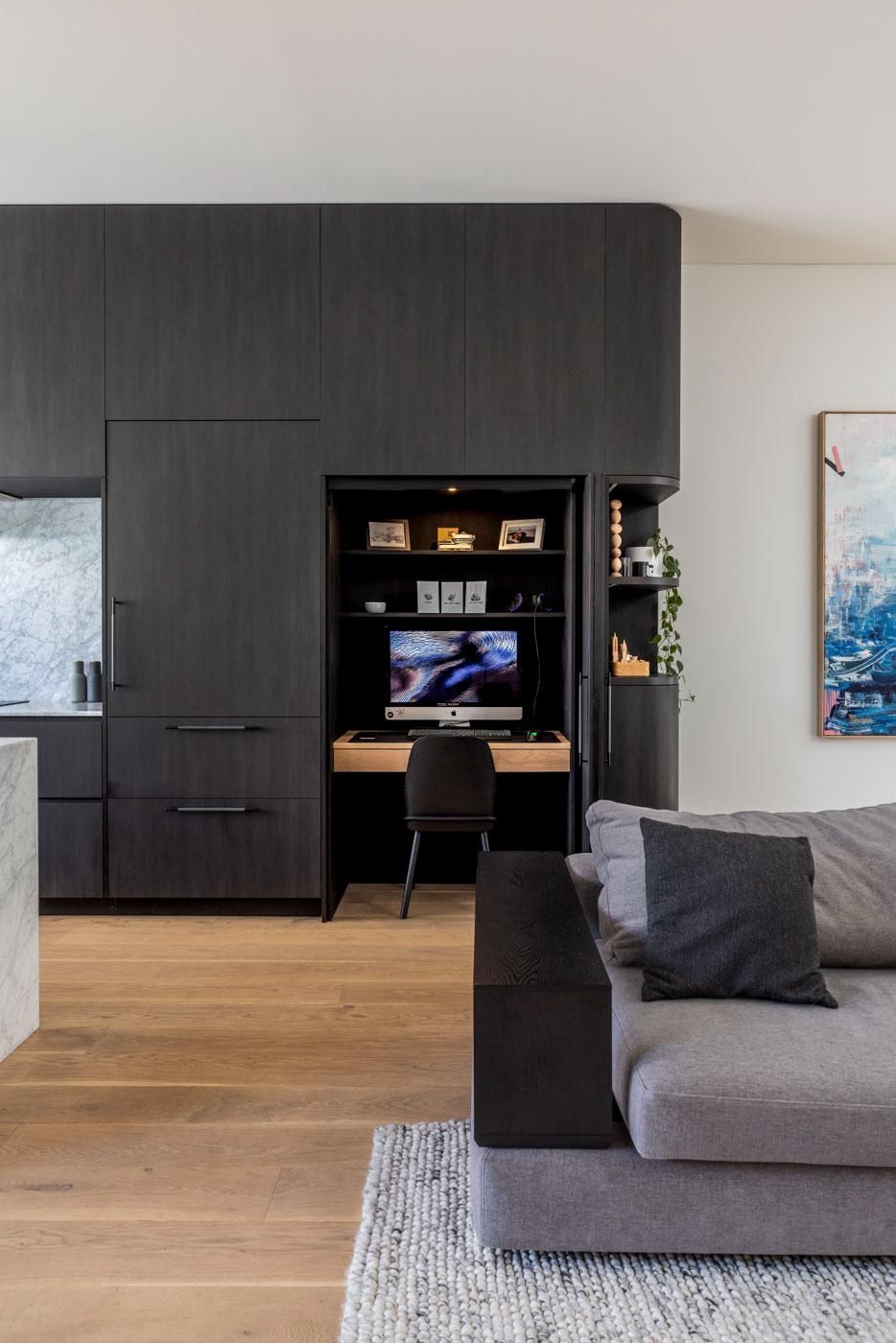 A Living Room with A Couch and A Desk with A Computer on It — Goode By Design in Unanderra, NSW