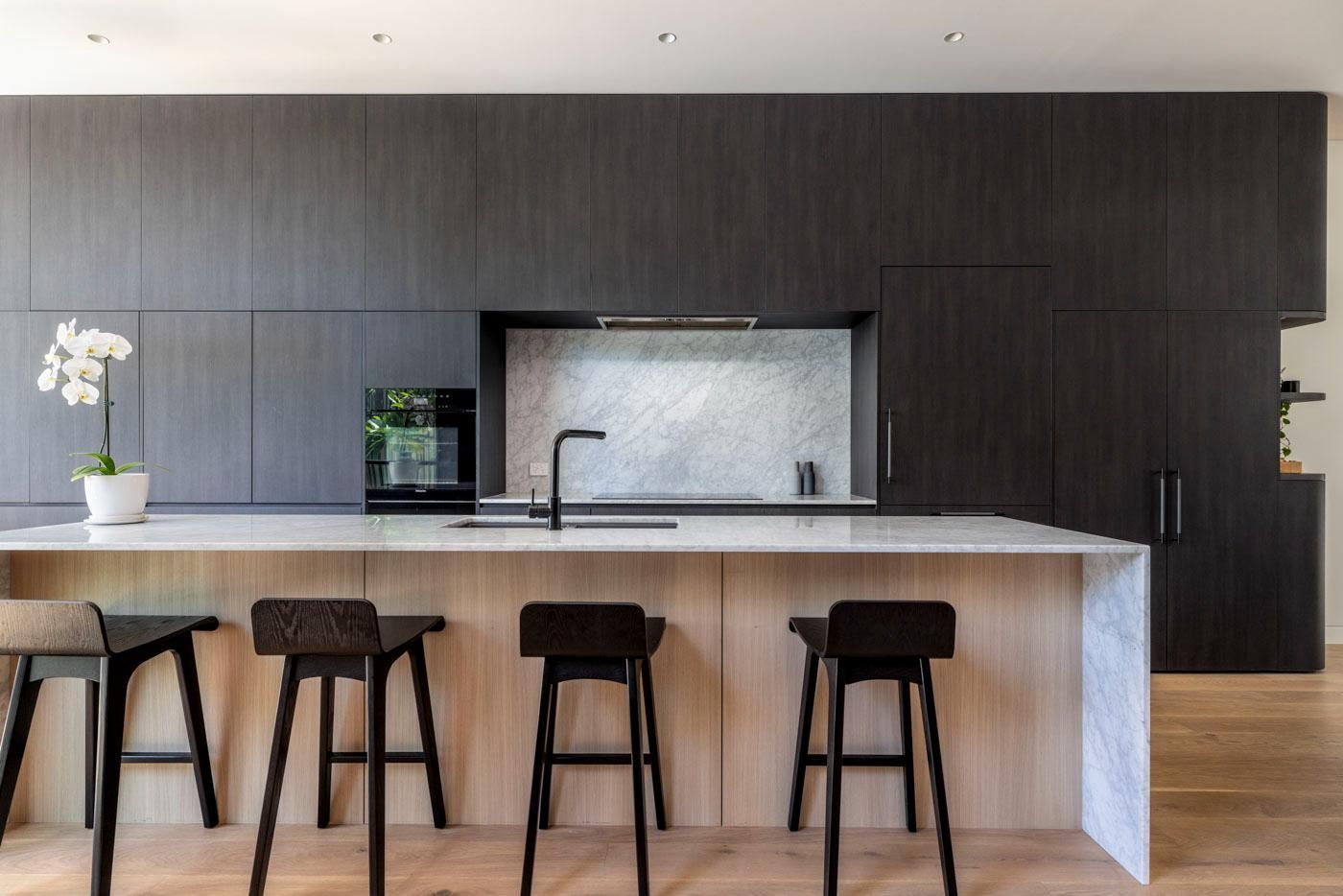 A Kitchen with A Large Island and Stools — Goode By Design in Unanderra, NSW