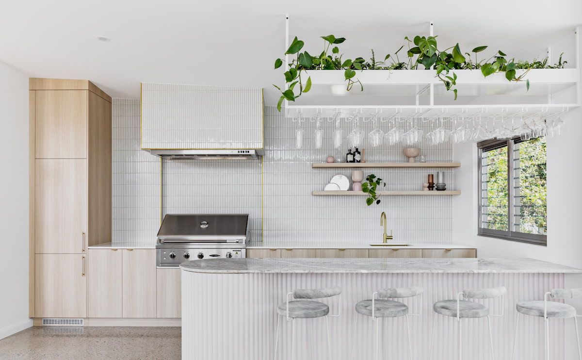 Modern Kitchen With Wood Cabinets, Marble Countertops — Goode By Design in Unanderra, NSW