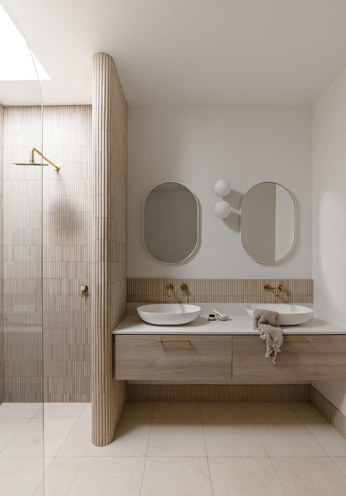 A Bathroom with Two Sinks, Two Mirrors and A Walk in Shower — Goode By Design in Unanderra, NSW
