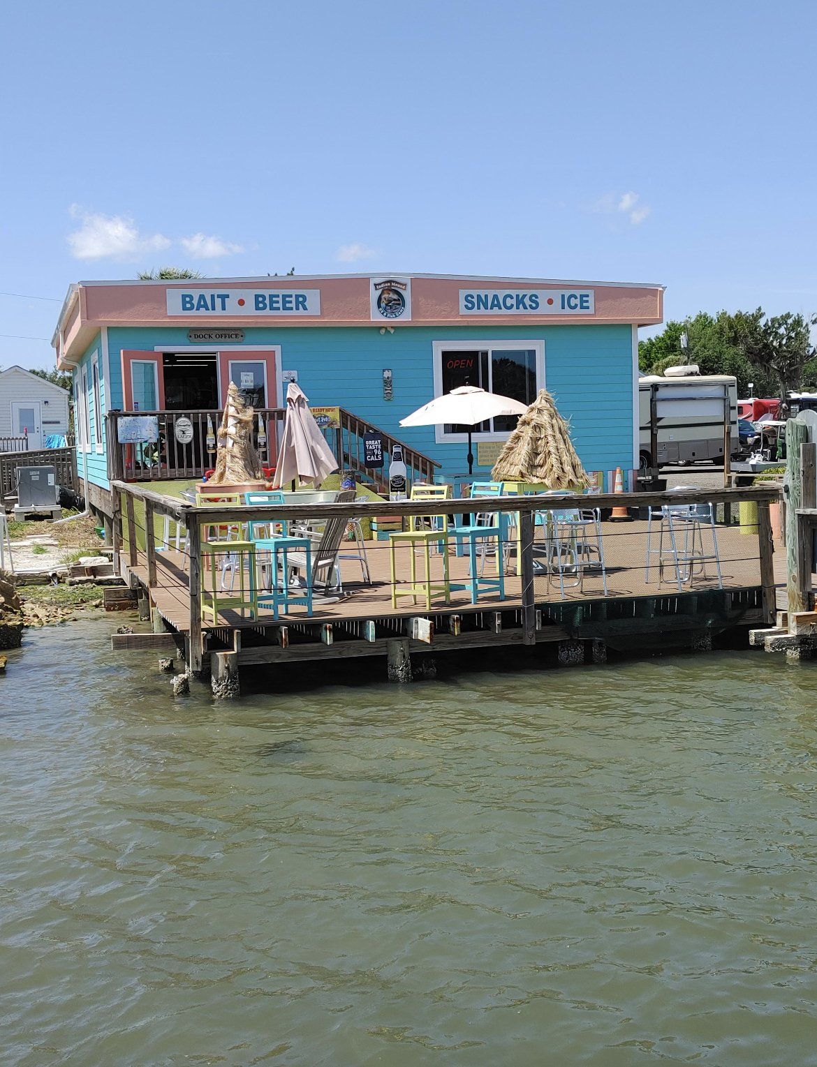 A blue building with the word snacks on it