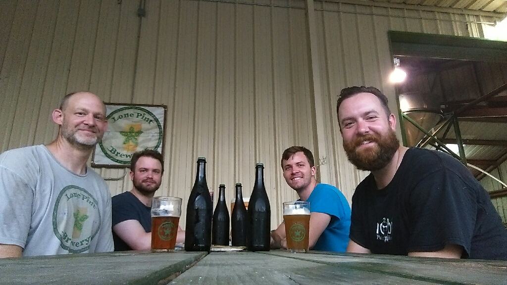 four men drinking craft beer - Magnolia, TX