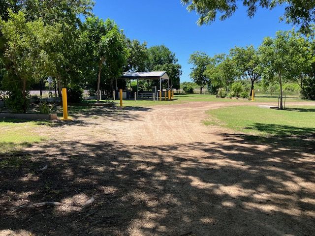 Dirt Road in a Park Leading to a Covered Structure — Karumba Point Holiday Tourist Park in Karumba, QLD