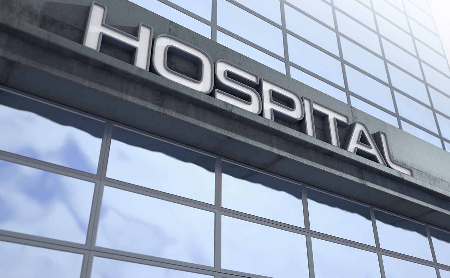 A large building with a sign that says hospital on it