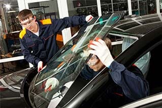 Two Mechanics working in Auto Repair Shop - Glass Replacement in Albuquerque,, NM