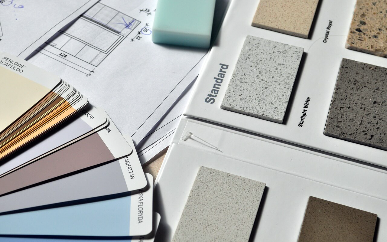 An assortment of paint and stucco / stone swatches.