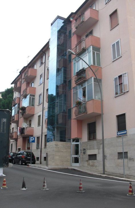 street with lift on the side of building