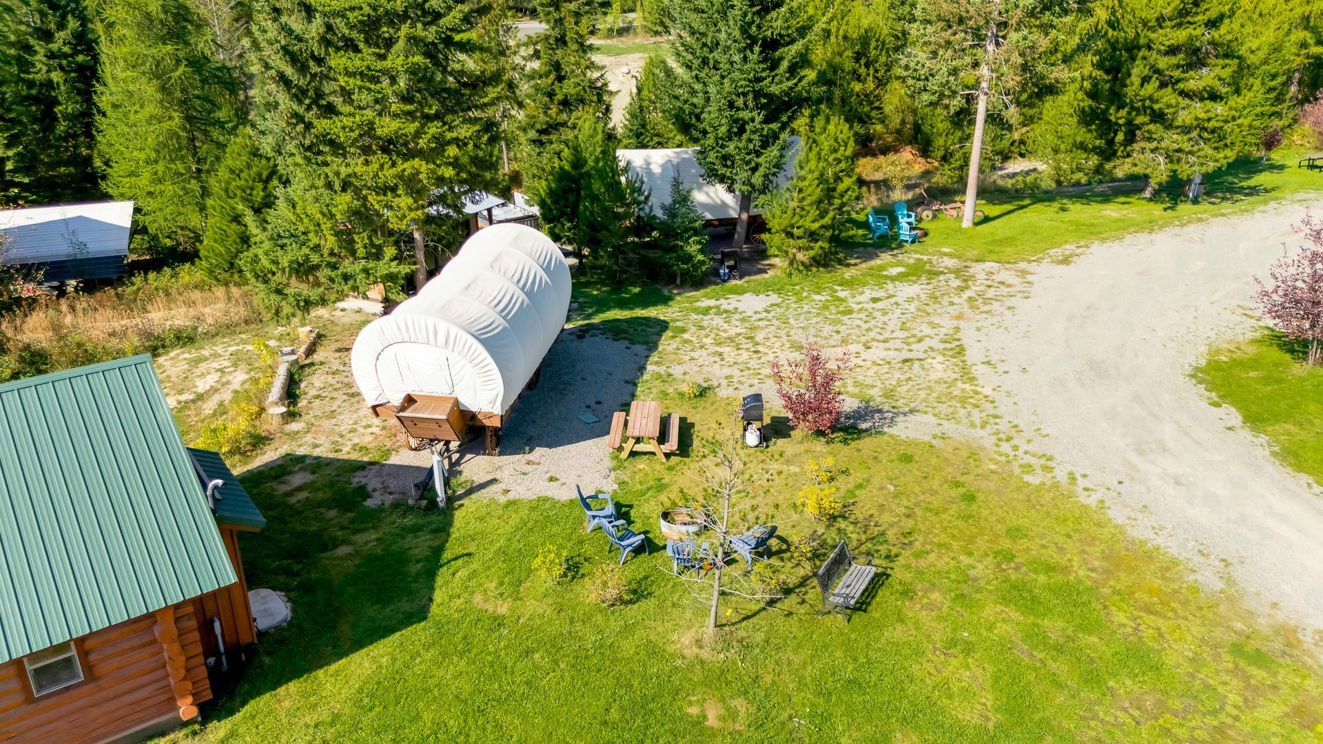 RV sites, luxury log cabins and a glamping campground with water electric sites and full hook up sites next to a pavilion, playground, hot tub, bathhouse in a wooded setting in Bonners Ferry, Idaho in the North Idaho pandhandle