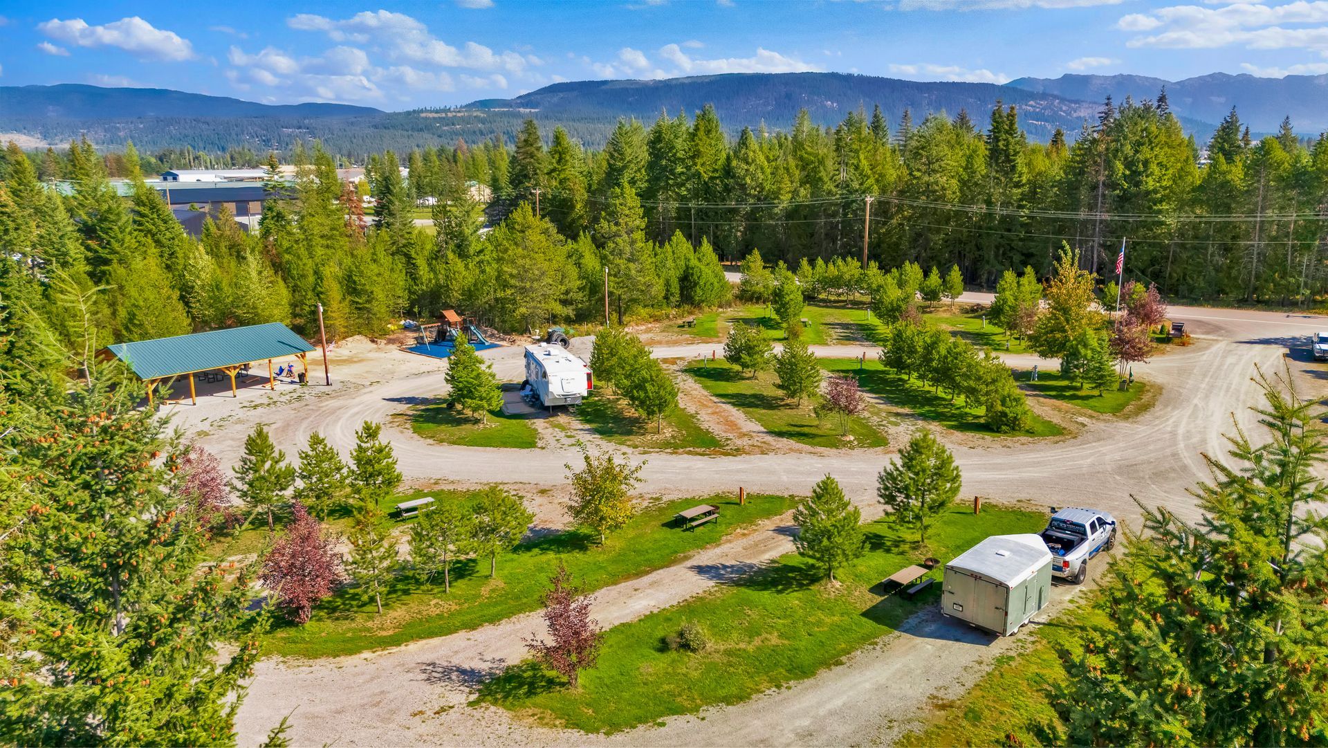 RV sites and campground with water electric sites and full hook up sites next to a pavilion, playground, hot tub, bathhouse in a wooded setting in Bonners Ferry, Idaho in the North Idaho pandhandle