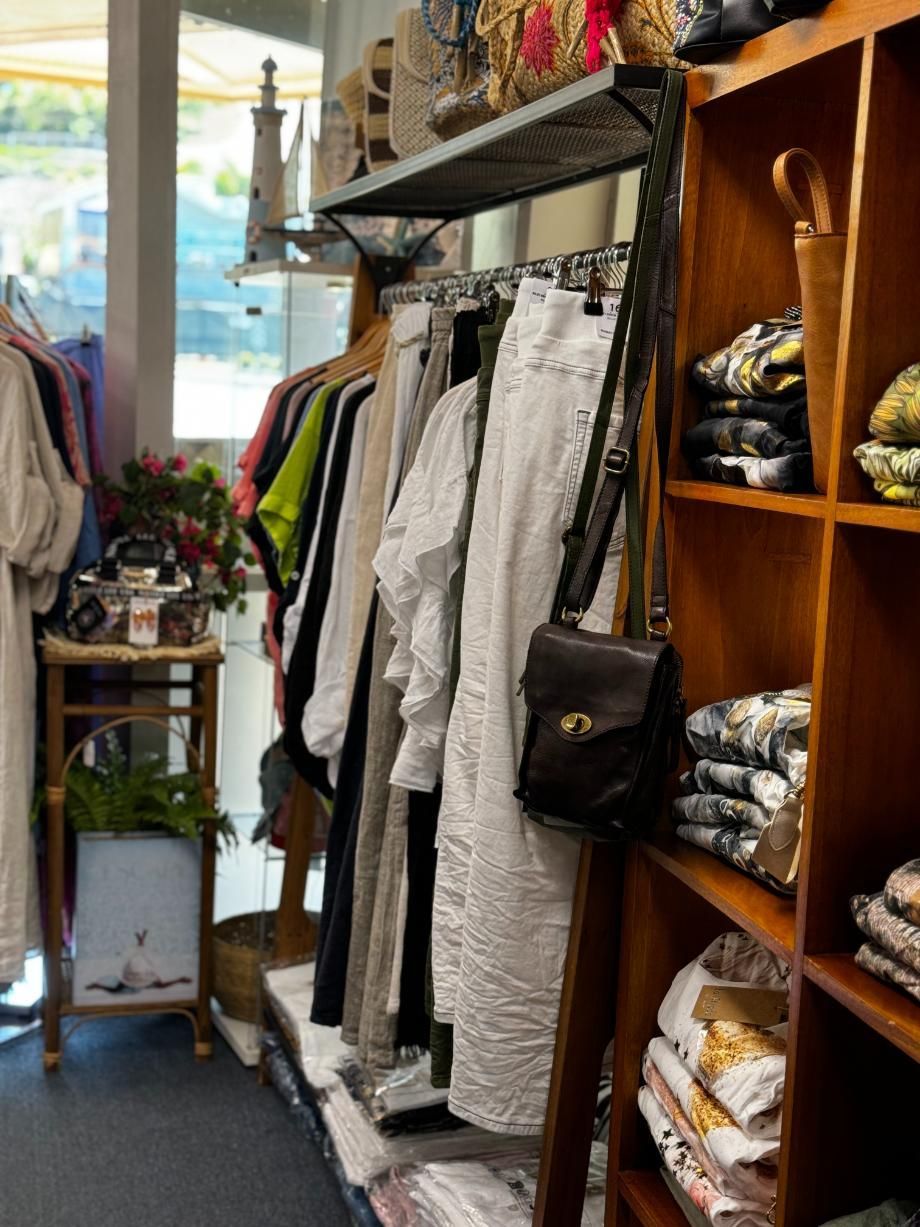 A Store Filled With Lots Of Clothes — Beach Time Trading Co In Yeppoon, QLD