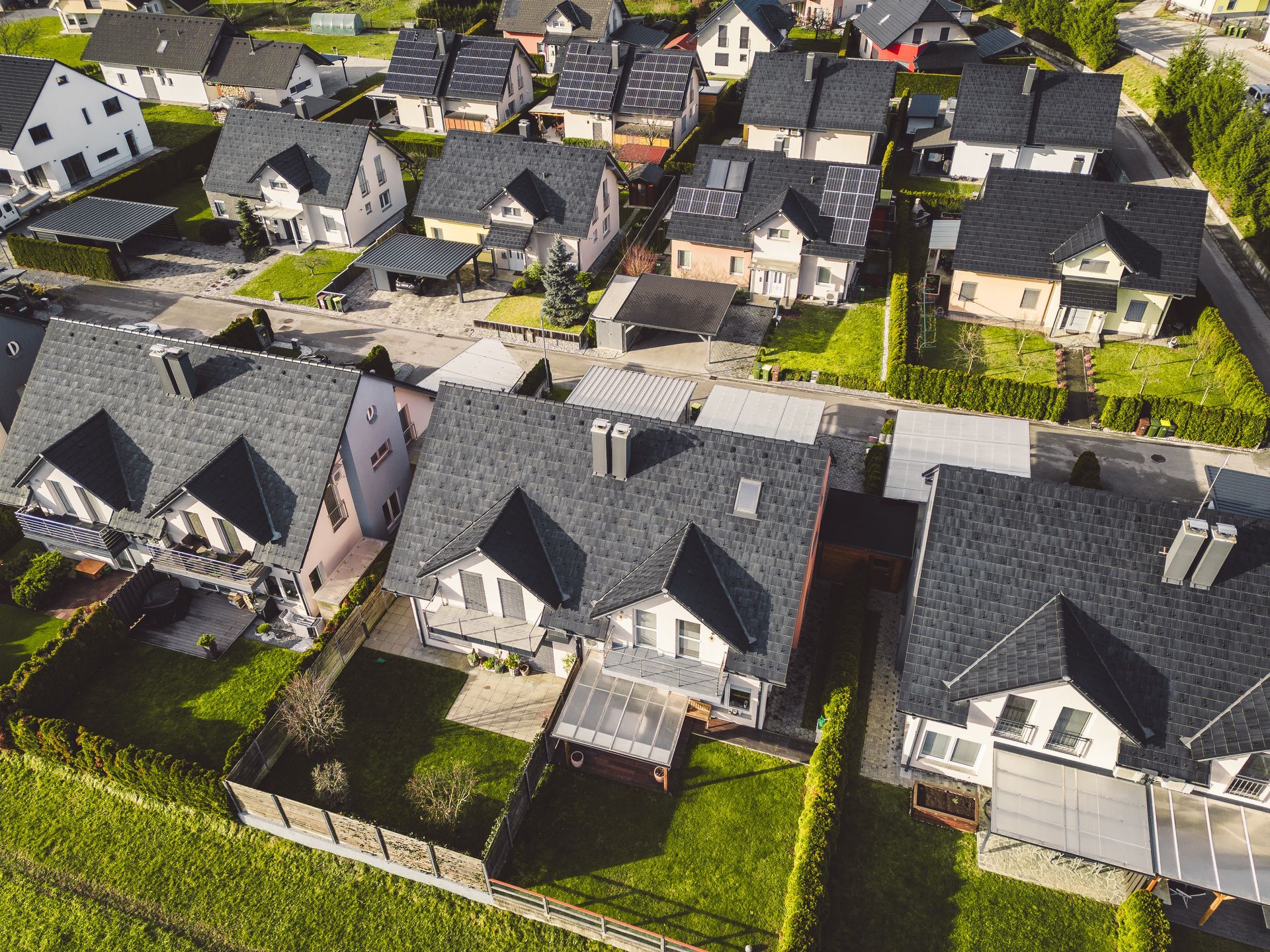 An aerial view of a residential area with lots of houses
