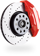 Red car brake disc with caliper, drilled holes, and mounting hub. | Acadia Auto Service