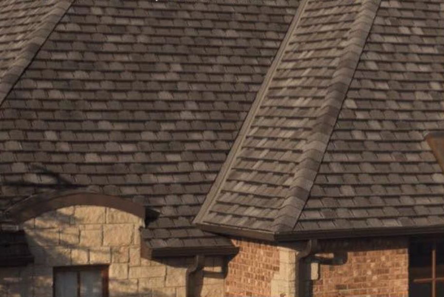 A close up of a wooden roof on a brick house.