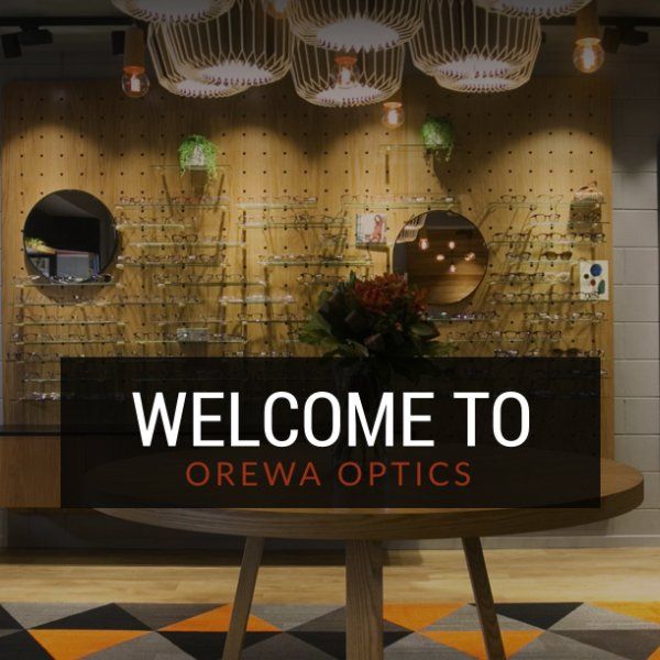 a sign that says welcome to oewa optics on it