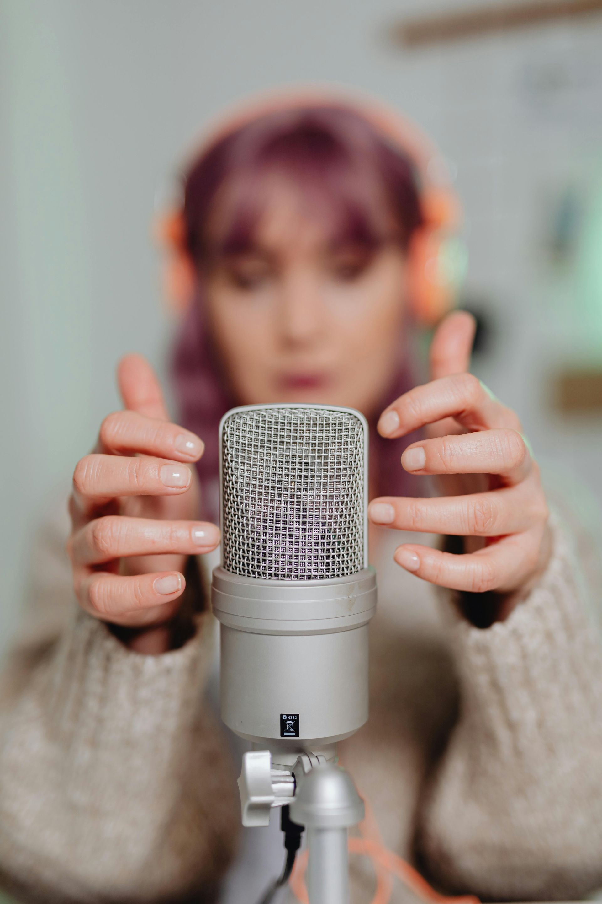 find your own voice, woman with a microphone