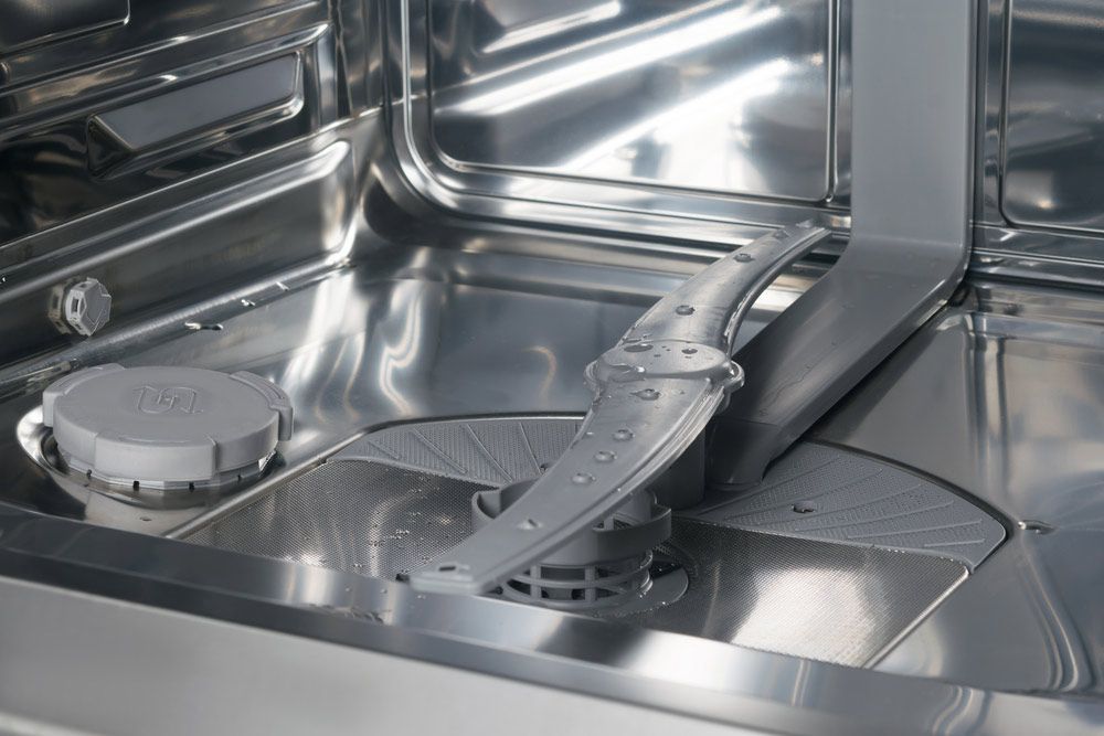 A Close Up Of The Inside Of A Dishwasher — Tweed Heads Appliance Parts & Repairs In Tweed Heads, NSW