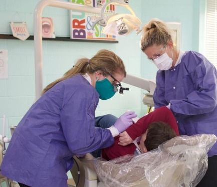 dentists performing a procedure