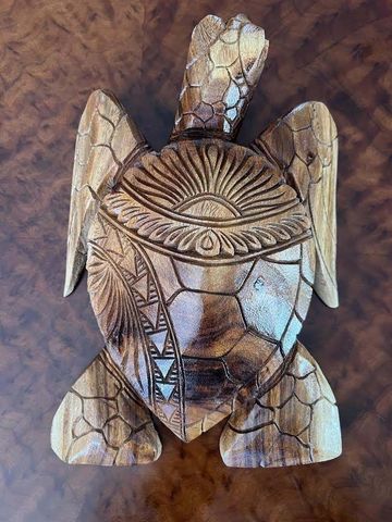 A Totem Pole with A Face Carved Into It — Aiea, HI — Auvaa Island Made LLC