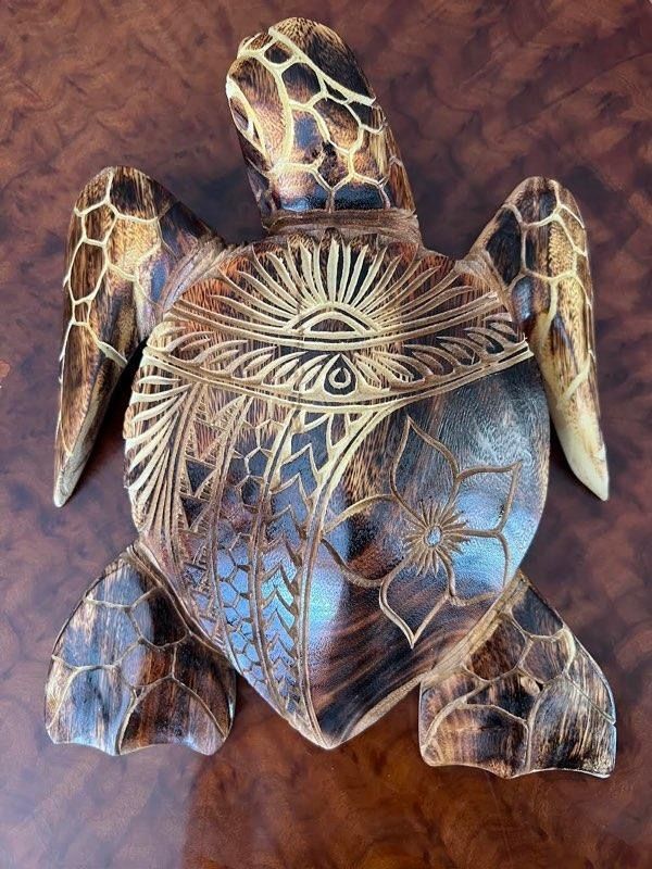 A Sea Turtle Is Swimming in The Ocean — Aiea, HI — Auvaa Island Made LLC