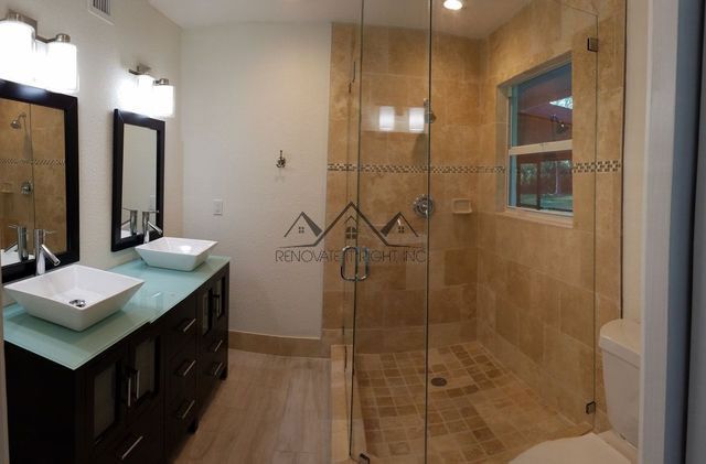 bathroom with glass shower enclosure