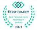 Expertise.com badge: Best Personal Injury Attorneys in Medford, 2021. Green laurel wreath and blue geometric logo.