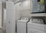 Thumbnail 8 of 27 - a laundry room with a washer and dryer and a refrigerator