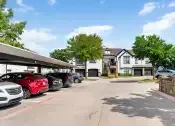 Thumbnail 25 of 27 - Covered Parking at Villas of Vista Ridge Apartments in Lewisville