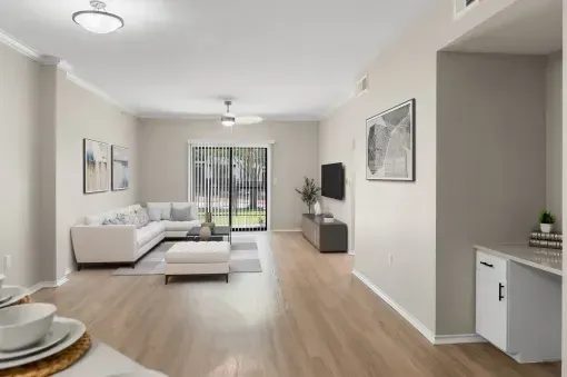Open living room with breakfast bar and built-in desk