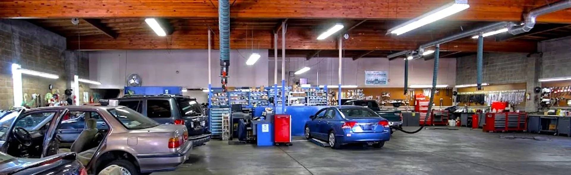 Vehicles at the garage in our auto repair shop | Berkeley Minicar