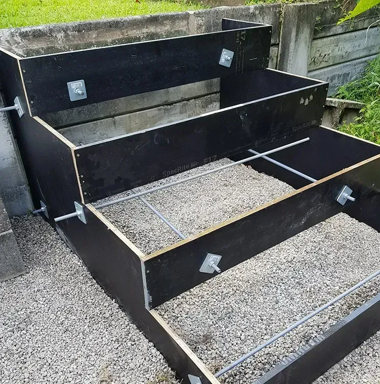 A Black Box is Sitting on Top of a Pile of Gravel — Small Batch Concrete Delivery in Carrara, QLD