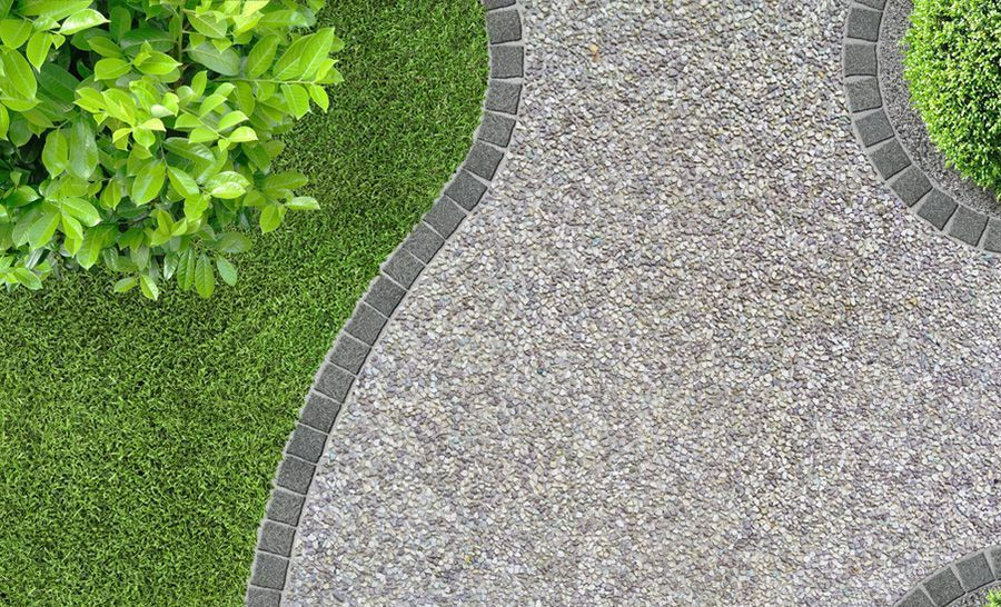 An Aerial View of a Walkway Surrounded by Plants and Grass — Small Batch Concrete Delivery in Gold Coast, QLD