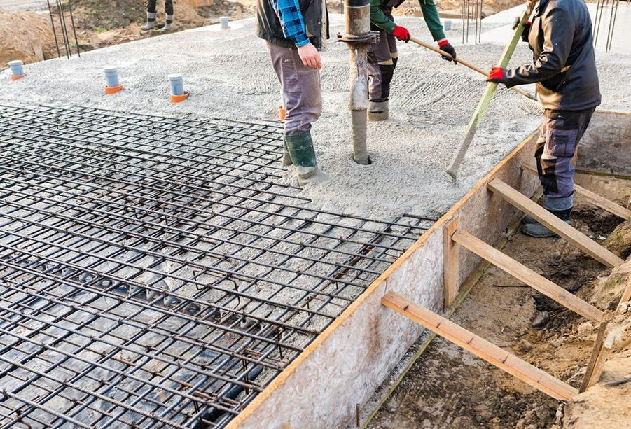 Construction Workers Are Working on a Concrete Foundation — Small Batch Concrete Delivery in Gold Coast, QLD
