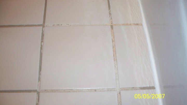 A picture of a tiled floor in a bathroom taken in 2007.