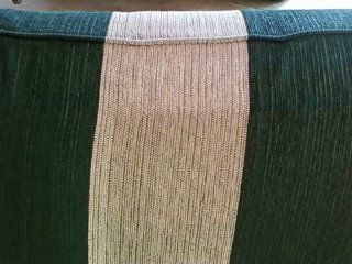 A close up of a green and white striped fabric.