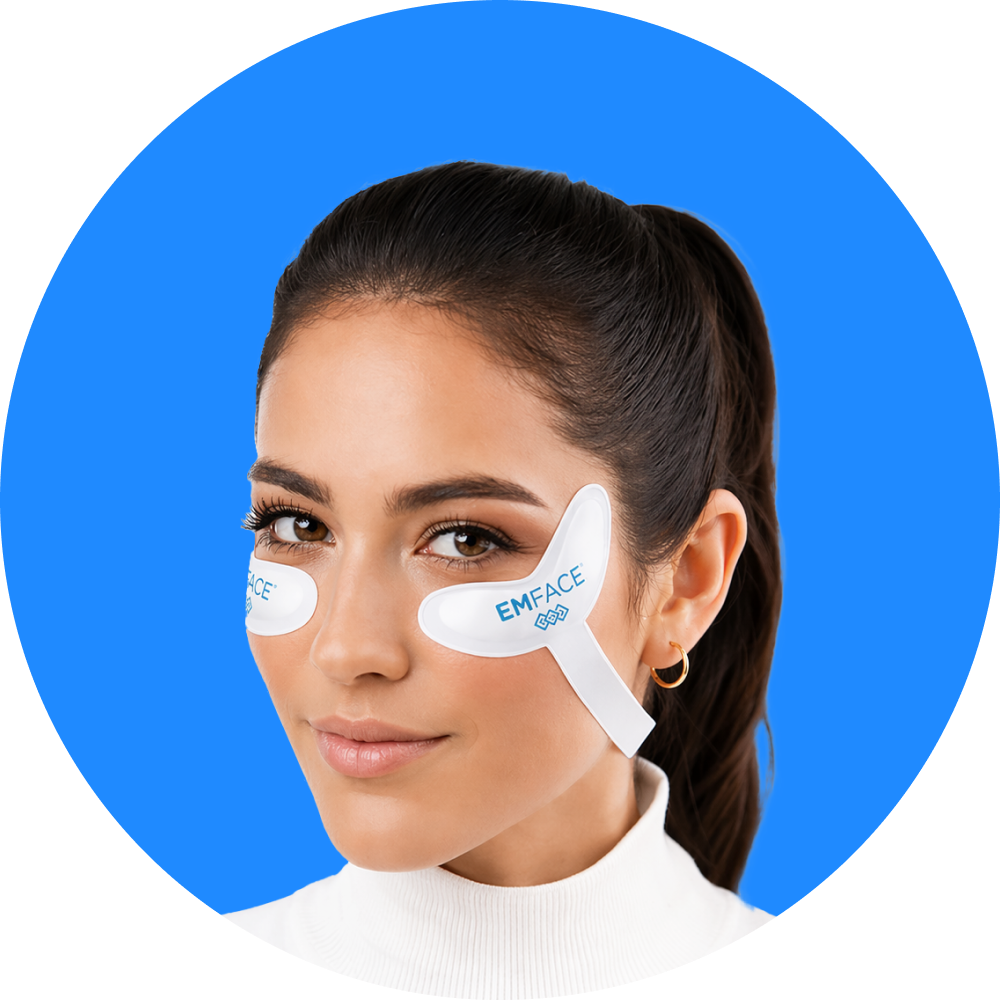Woman with white eye mask patches on a blue background.