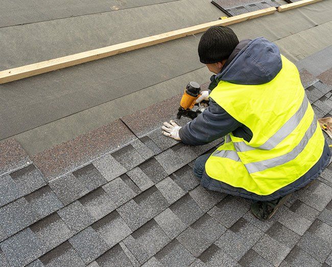Man Installing Roof — Savannah, GA — Horton's Roofing & Repair