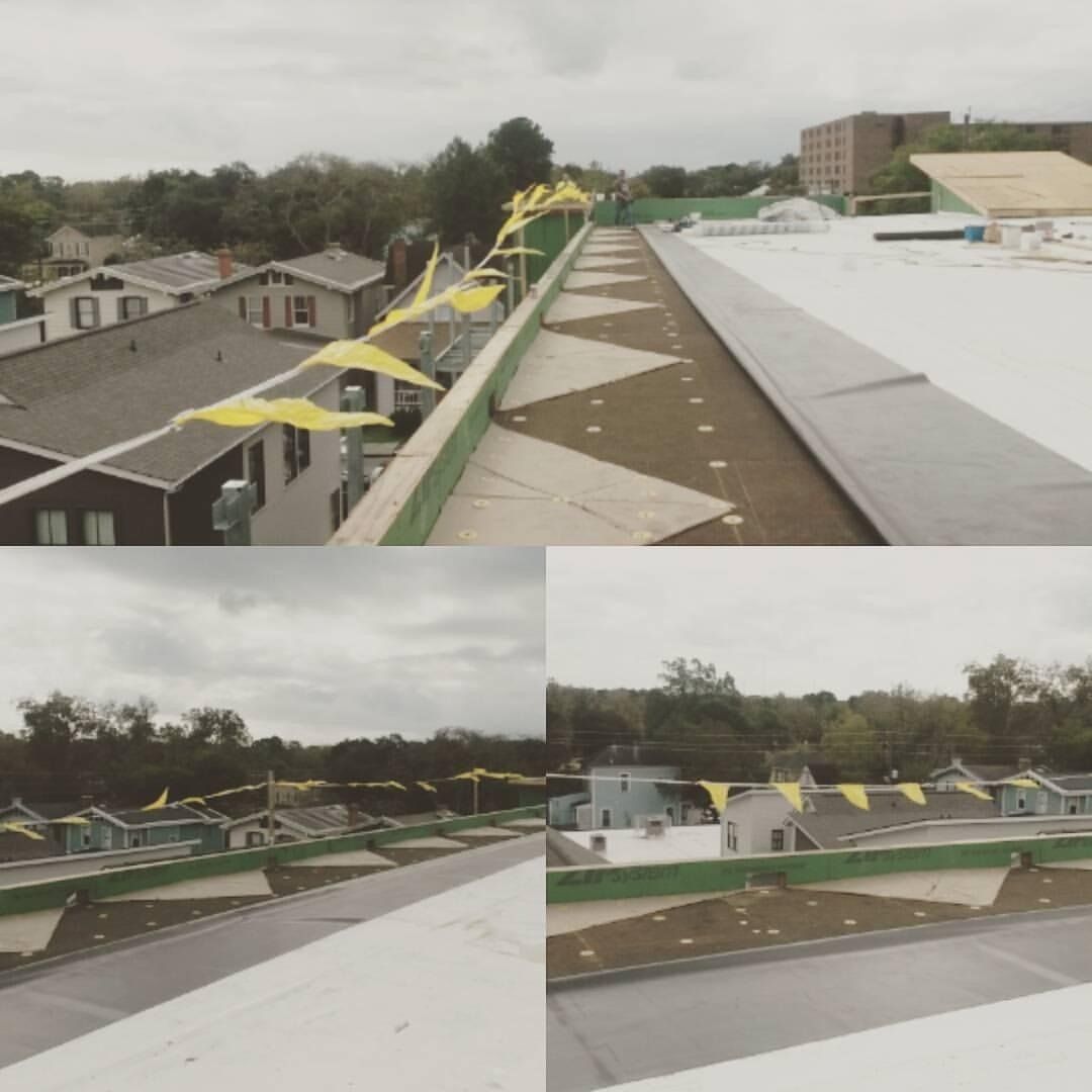 A collage of four pictures of a roof with yellow flags