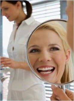 Woman Looking into a Mirror — Free consultation in Yakima, WA