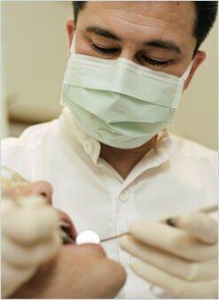 Dentist Working on a Patient's Teeth — Ivory Denture Care in Yakima, WA
