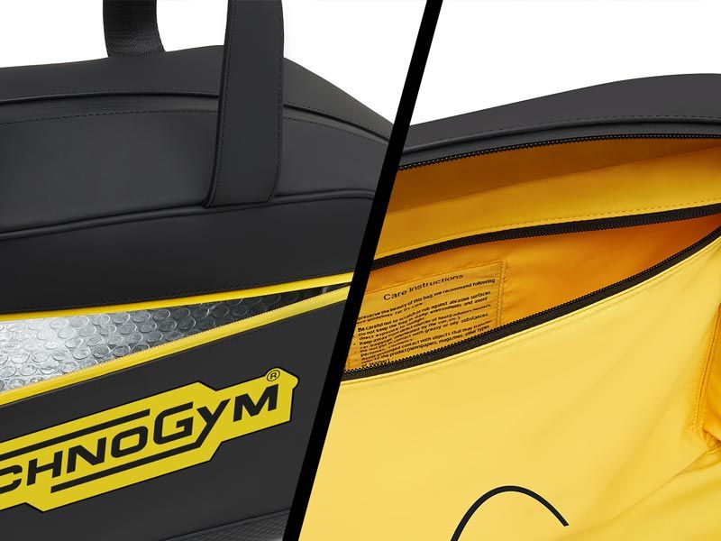 Crno-žuta torba sa natpisom technogym