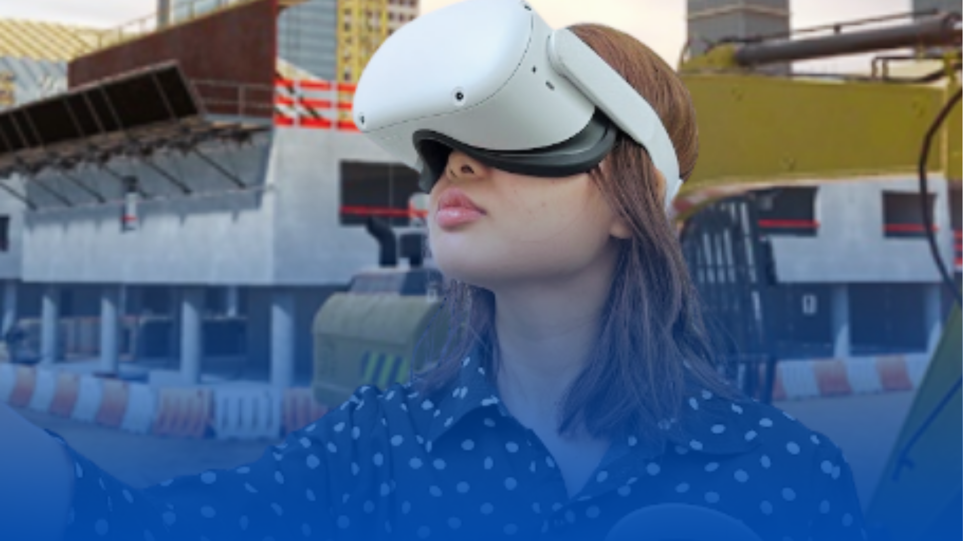 A man wearing a virtual reality headset is standing in front of a large screen.