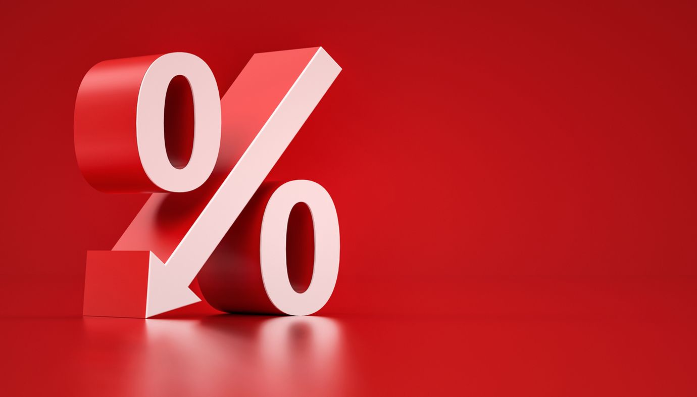 A red and white percent sign on a red background.