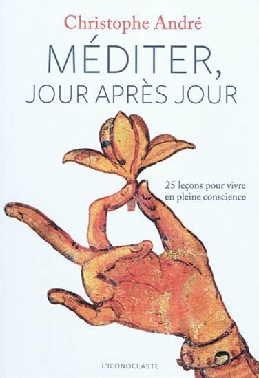 Book cover: hand holding flower, title 