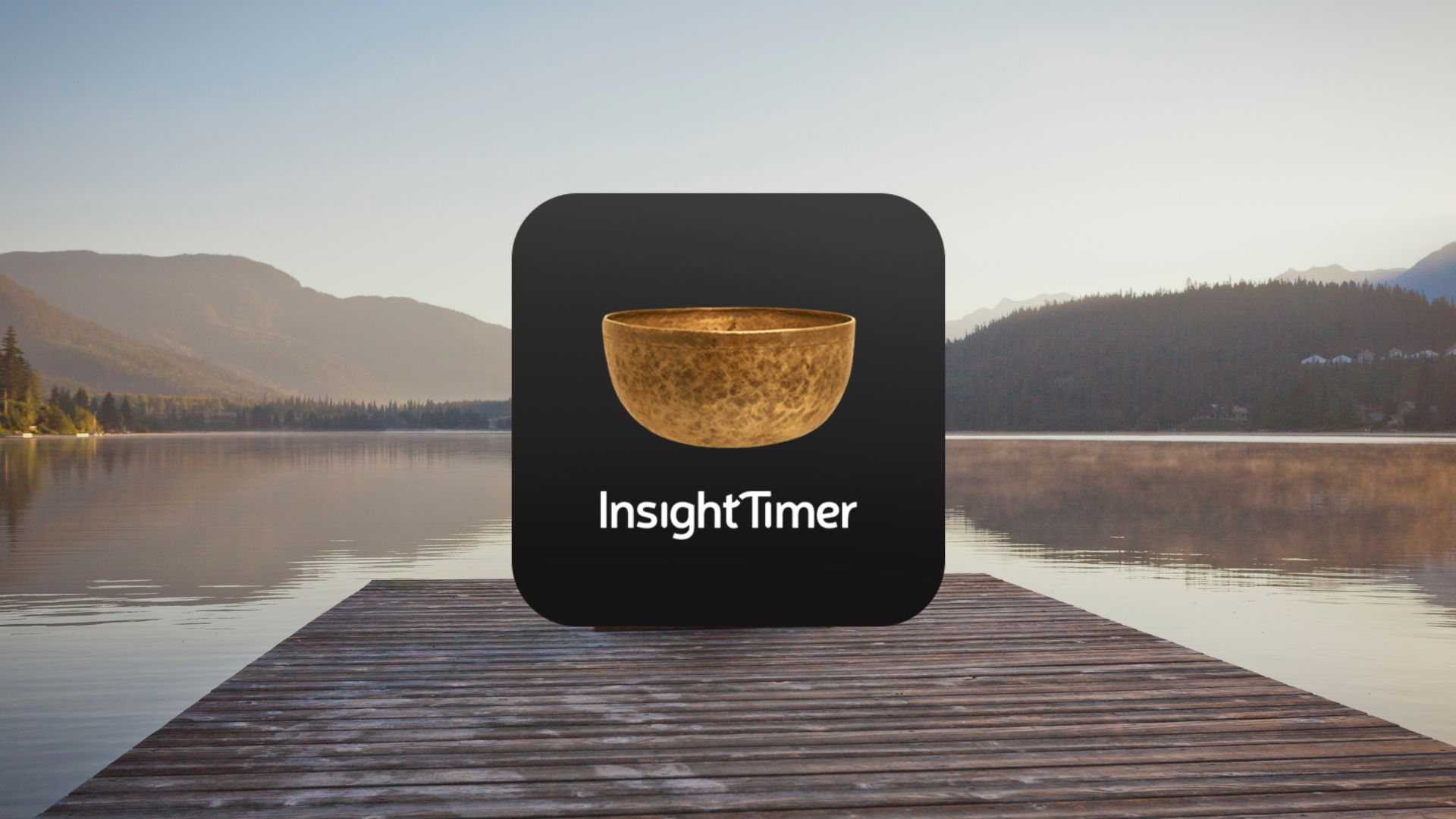 Icône de l'application InsightTimer sur un quai surplombant un lac et des montagnes.