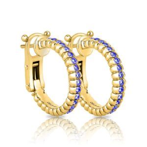 A pair of yellow gold hoop earrings with blue stones
