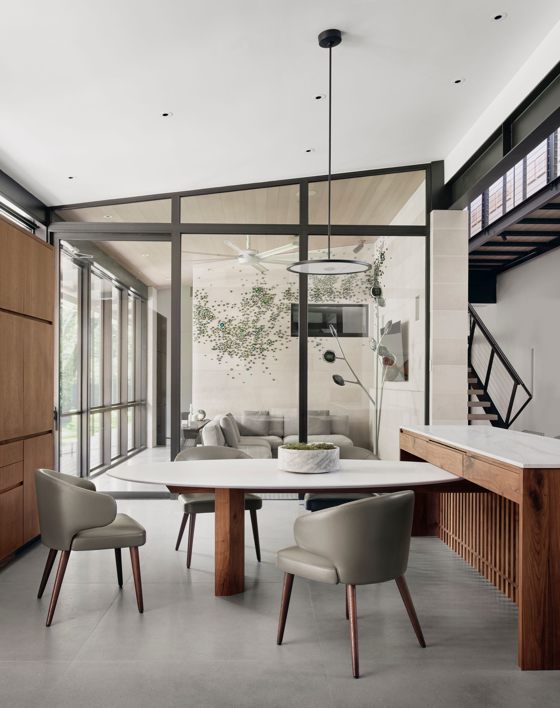 a dining room with a table and chairs in it