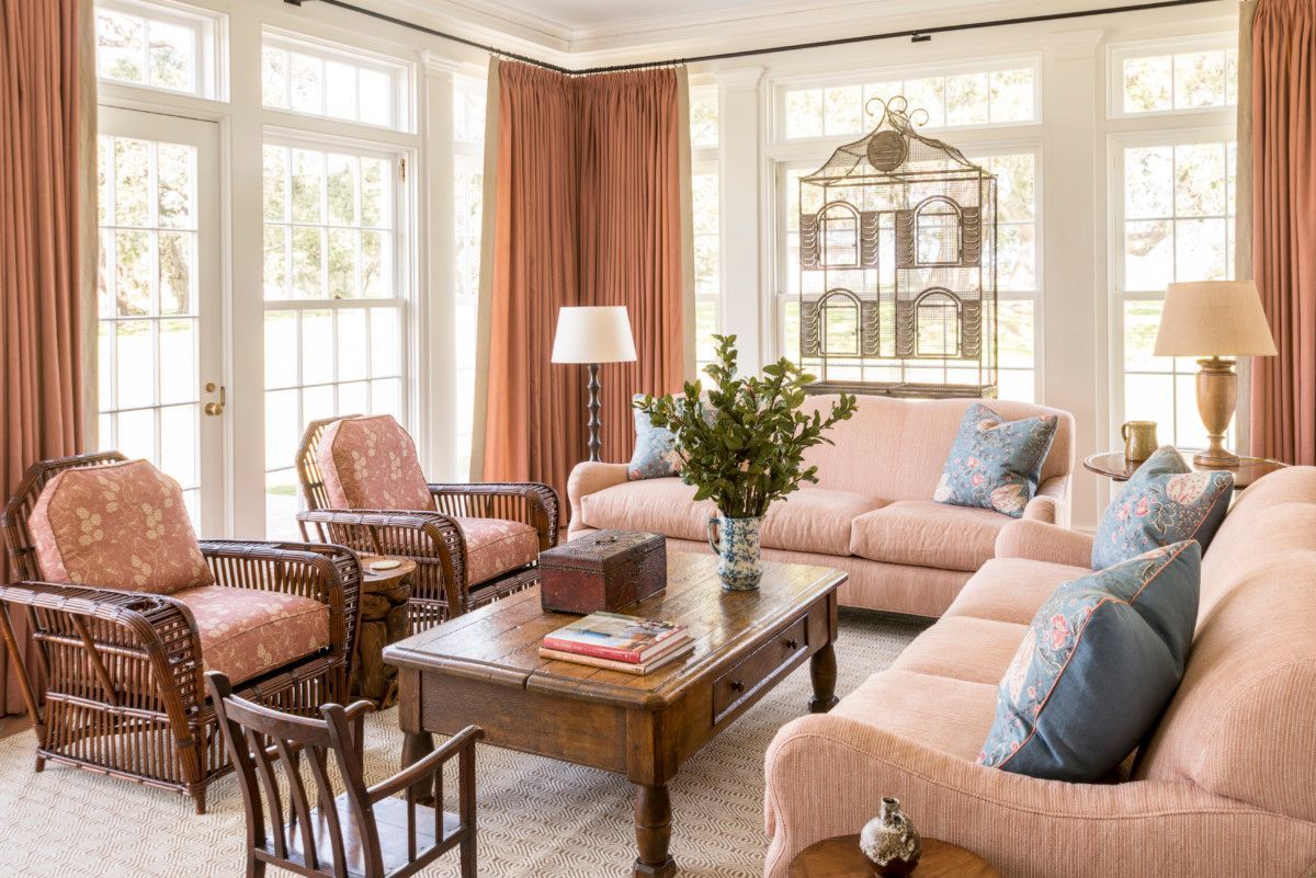 a living room filled with furniture and a couch .