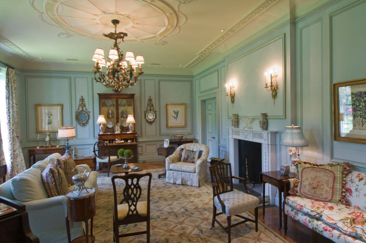 a living room filled with furniture and a fireplace .