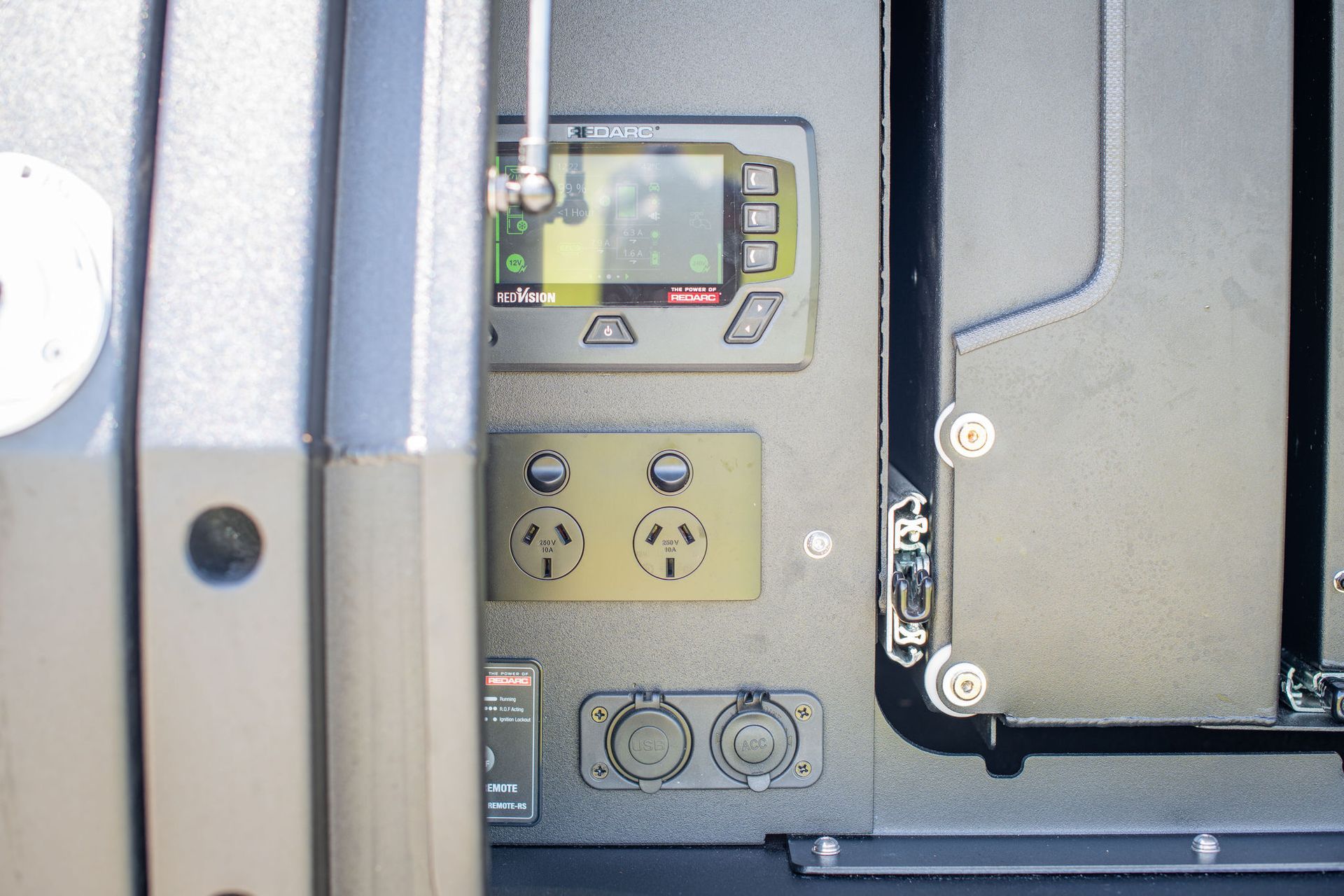 Panel With Control Screen, Power Outlets, and Ports — Custom RV Creations in Sumner, QLD